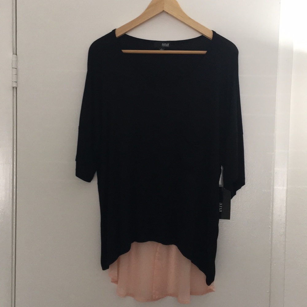A.N.A black hi-lo top. Never been used.